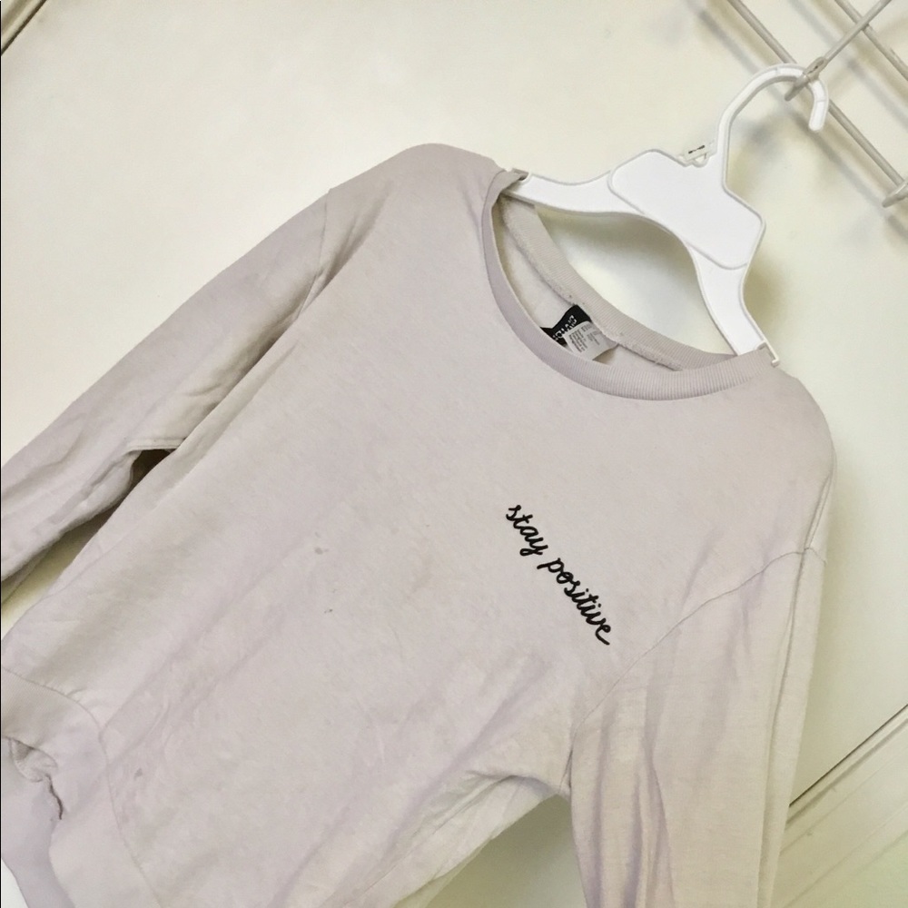 “ stay positive “ cursive sweater